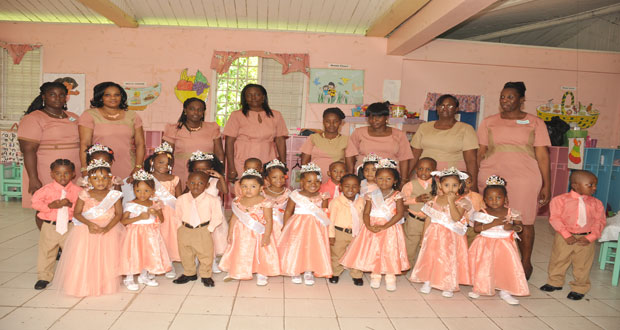 Pre-schoolers 2 Graduates with Nursery Assistants at their graduation yesterday:  Fourth from right in background is class supervisor, Ms. Paulette Beaton.