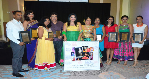 Dr. Vindhya Persaud, director and choreographer of the production with the recipients of long-service awards (Photos by Adrian Narine