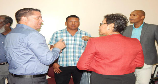 GFF Technical Director Claude Bolton (L) and minister within the Ministry of the Indigenous People’s Affairs Valerie Garrido-Lowe, along with GFF NC Chairman sharing a light moment after their July 1 meeting.