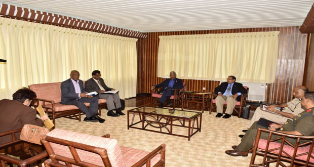 President David  Granger (fourth left) in discussion yesterday with, from left, Minister of Social Cohesion, Ms Amna Ally; Minister of State, Mr Joseph Harmon; Minister of Public Security, Mr Khemraj Ramjattan; Prime Minister, Mr Moses Nagamootoo; Commissioner of Police, Mr Seelall Persaud; and Deputy Chief of Staff of the Guyana Defence Force, Colonel Kemraj Persaud. The meeting was held at the Ministry of the Presidency (Photo courtesy of the Ministry of the Presidency)