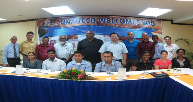 Participants at the NAMILCO Noodles Seminar pose with Managing Director, Bert Sukhai (center standing) and Dr Gary Hou (left of Managing Director). Far left is Mr Afeeze Khan who was the MC at the event