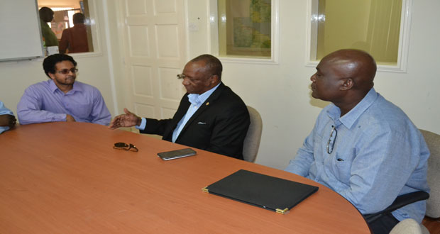 From left, Minister of State Joseph Harmon; Head of the e-Governance project, Alexei Ramotar; and Government’s Adviser on e-Governance, Floyd Levi