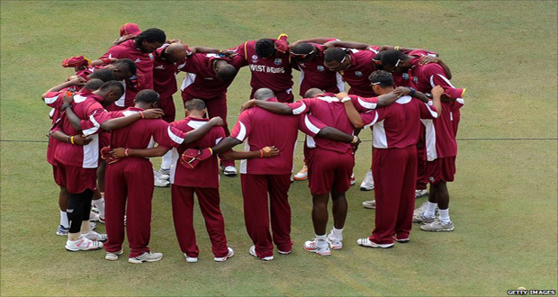 West Indies huddled in prayer