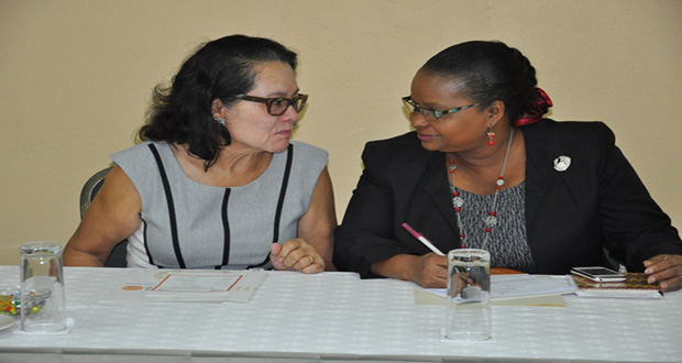 First Lady Sandra Granger ( left) with Minister of Social Protection, Volda Lawrence