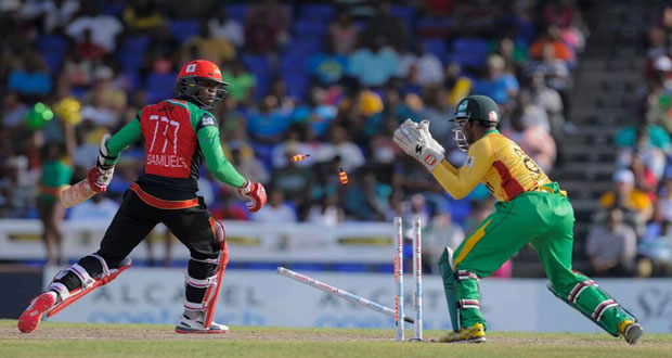 Devendra Bishoo takes the wicket of Shahid Afridi for 3 before dismissing Marlon Samuels with his next delivery. at Warner Park in St Kitts.