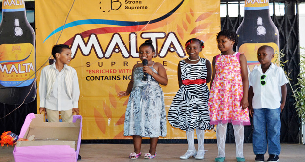 A  few of the children participating in a skit.