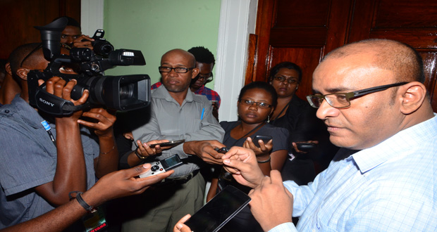 Opposition Leader Bharrat Jagdeo briefing members of the press corps yesterday outside the Chamber of the National Assembly
