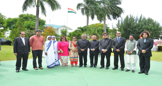 Indian High Commissioner Venkatachalam Mahalingam (centre) with others who took part in yesterday’s flag hoisting ceremony