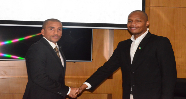 Former Trinidad and Tobago International David Nakhid (L) and GFF Normalisation Committee Chairman Clinton Urling after their meeting yesterday at the Marriott Hotel. (Adrian Narine photo)