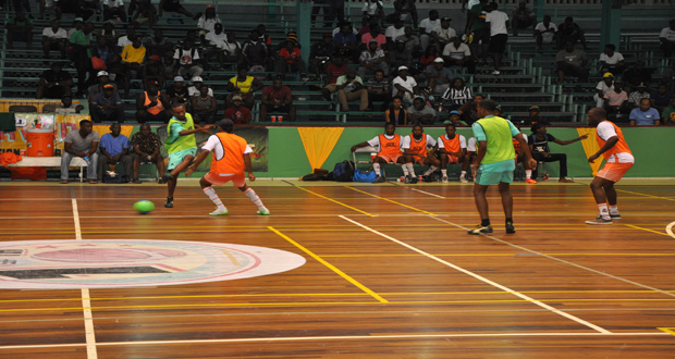 Part of the opening night’s action in the Petra Organisation/GT Beer Futsal tournament at the Cliff Anderson Sports Hall.
