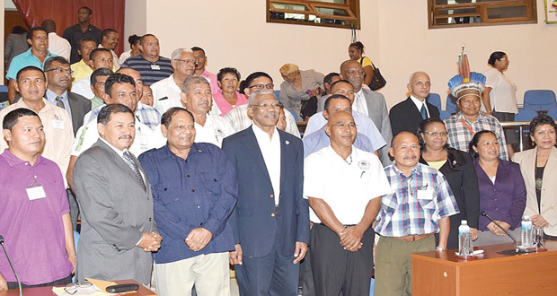 President David Granger, Prime Minister Moses Nagamootoo and Vice President and Minister of Indigenous People’s Affairs Sydney Allicock  with newly elected officials of the National Toshaos Council and other members of the Cabinet. [File Photo]