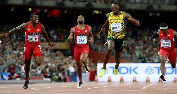 From left: Justin Gatlin and Tyson Gay from the U.S. and Usain Bolt of Jamaica compete in the men's 100m final during the 15th IAAF World Championships at the National Stadium in Beijing, China, yesterday. (Reuters)