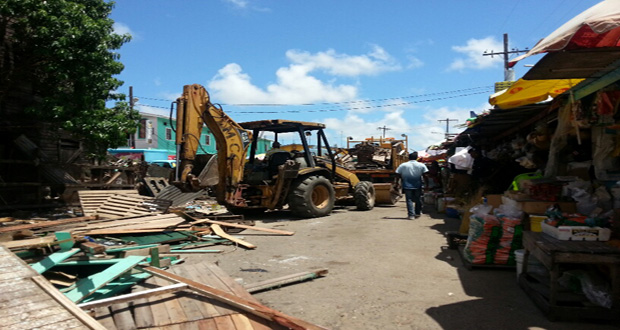 The M&CC bulldozer dismantling stalls at Bourda Market yesterday