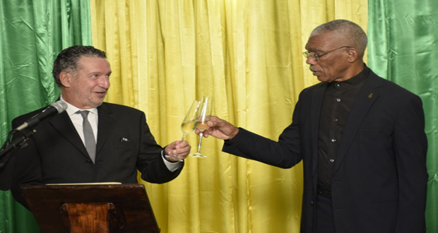 President David Granger and Brazilian Ambassador, His Excellency Lineu Pupo de Paula proposing a toast to the good health of President Dilma Rouseff, President of the Federative Republic of Brazil, on the occasion of the country's 193rd Independence Anniversary