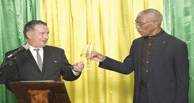 Viva Mexico! President David Granger and  Ambassador  Ivan Robero Sierra Medel toast to continued friendly bilateral relations between Guyana and Mexico 
