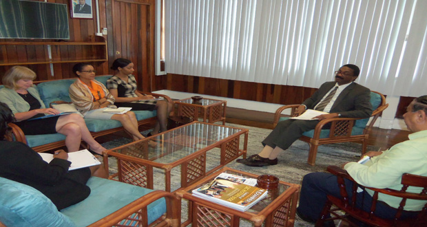 The AG in discussion with stakeholders at his office