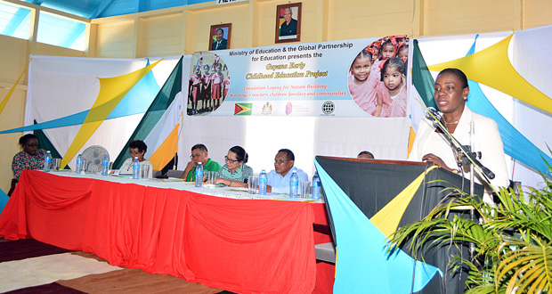 Minister of Education, Nicolette Henry addressing the gathering at the launch of the Early Childhood Education Project yesterday. Sitting at the head table (from left) are; Minister within the Ministry of Social Protection, Simona Broomes; Minister within the Ministry of Indigenous Peoples’ Affairs Valarie Lowe; Minister of Indigenous Peoples’ Affairs, Sydney Allicock; First Lady, Sandra Granger; and Regional Education Officer, Charles Holmes