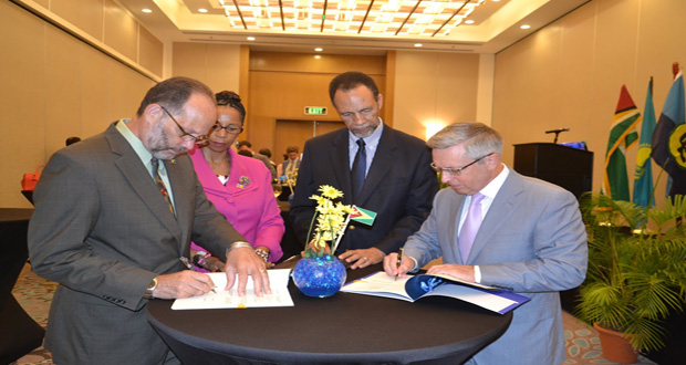 Secretary General of CARICOM Irwin LaRocque and Ambassador Konstantin Zhigalov signing the agreement for the US$250,000 Water Resource Management Plan