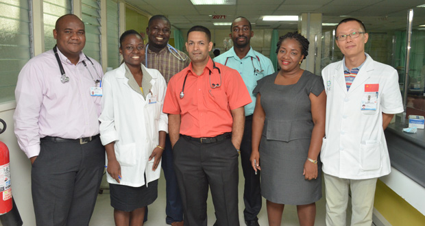 In photo from left are: General Practitioner (GP) Dr. Gorvinski Fraser, Claudia White (Pharmacist), Dr. Joel Joseph (GP), Transplant Kidney Surgeon Dr. Kishore Persaud, Dr. Josmond Austin, a social worker, and Dr. Zuxujun at the Intensive Care Unit (ICU) at the GPH, yesterday