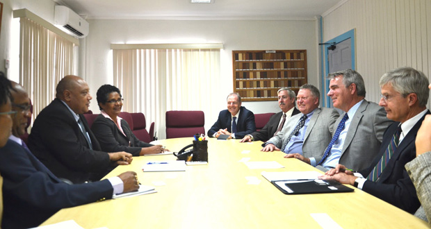 Minister of Governance, Raphael Trotman and Technical Officer at the Department of Natural Resources, Euileen Watson, with the Executives of oil giant, ExxonMobil at the meeting held on Wednesday