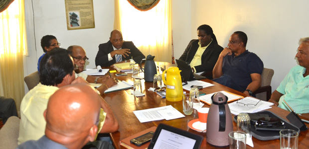 Minister Trotman makes a point to President of the GGDMA, Terrence Adams