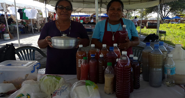 Lolita Williams and Jane Campbell display their Amerindian cuisine and beverages