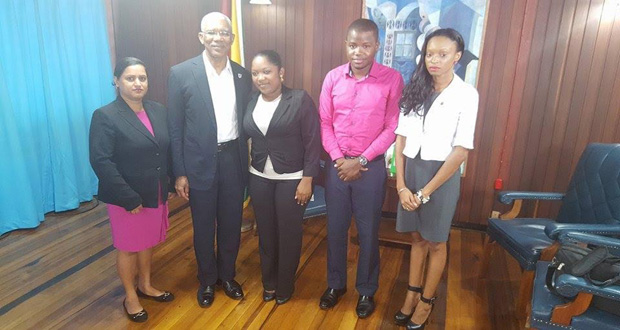 Reporters who participated in The Public Interest pose for a photo with President David Granger and Moderator Malika Ramsey, following the yesterday’s recording