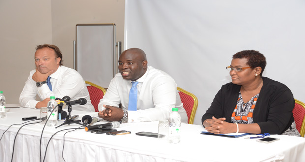 Acting GTT CEO Justin Nedd making a point at the press briefing.  New Sales and Marketing Manager Gert Post and Public Relations Officer Allison Parker look on (Delano Williams photo)