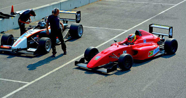 Calvin Stanley Ming (right) tests one of his two Mygale F4 cars.