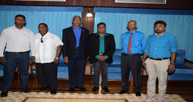 President David Granger (third left) with members of the West Berbice Chamber of Commerce- They are, from left: Tage Singh, Dr. Alexander Sinclair, Imran Saccoor, Pradeep Bachan and Hardat Malchand