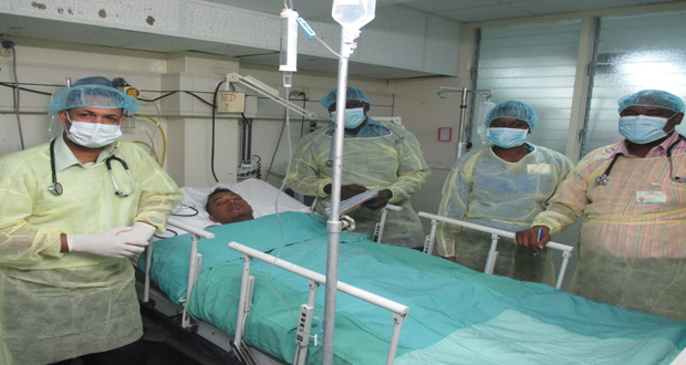 The kidney transplant team poses with the patient, Kiran Hardyal during his recovery at the GPHC