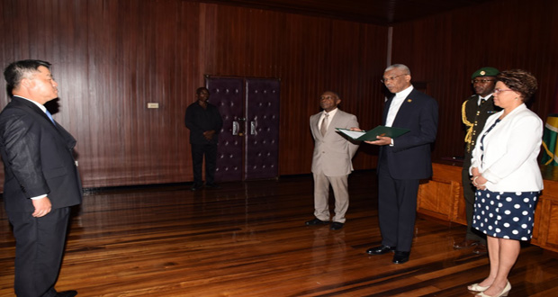 President David Granger and Korea’s non-resident Ambassador to Guyana, His Excellency, Maeng Dal Young, in discussion following the accreditation ceremony.