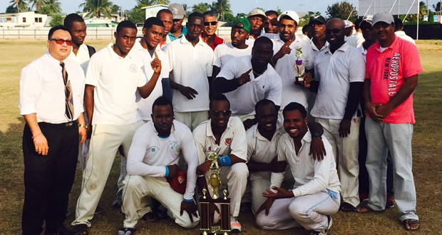 Bravados Cricket Club celebrate with their trophy. At left is ECCB president Bissoondyal Singh