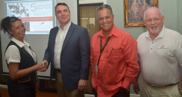 Captain Gouveia, along with his wife who is the manager of Roraima Group of Companies, Debbie Gouveia, shares a moment with  Chief Operations Officer of Dynamic International John Mullins, (centre) and another Dynamic Airways official