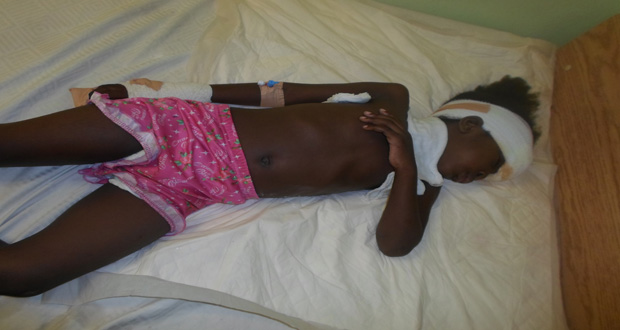 Three-year-old Angel Baynes on her hospital bed after being injured in the accident at Haslington on Sunday