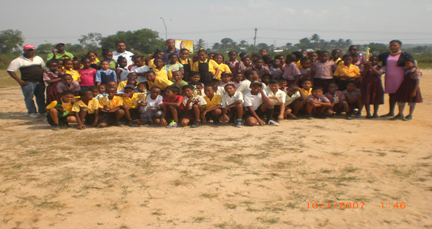 Students, teachers and members of the Windball organisation pose for the cameraman.