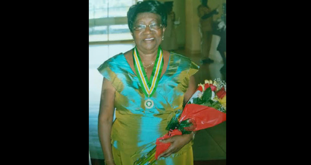 Mrs Edith Bynoe poses with her Cacique’s Crown of Honour (CCH) at the National Cultural Centre.