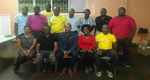 The recently voted in UDFA member ssit with Chairman of the GFF Normalisation Committee Clinton Urling.