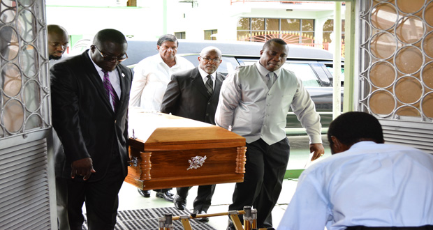 The  body of Mr. Raschid Osman being taken into First Assembly of God Church for  a Thanksgiving Service for his life