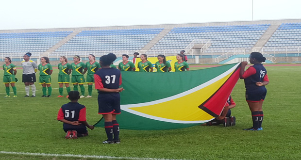 The Lady Jags during the playing of Guyana’s Anthem before their game against Puerto Rico