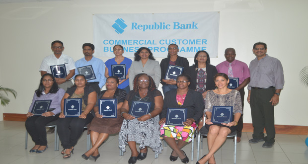 Graduates and resource persons at Republic Bank’s New Market Street facility at Wednesday’s closing ceremony for the Commercial Customer Business Programme. Fourth from left is Business Development Officer, Executive Education, Ms. Gayathri Selvam of the Arthur Lok Jack Graduate School of Business, and third from right is Ms Parbatie Khan, General Manager (Credit) Republic Bank (Guyana) Limited