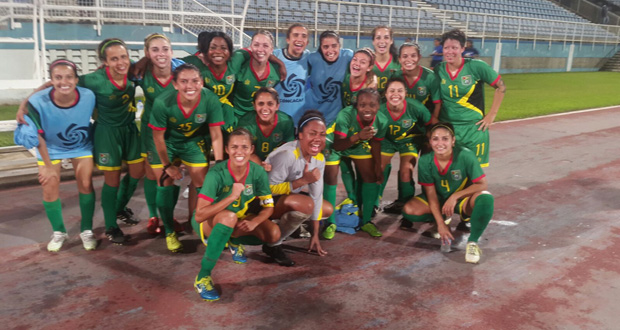 The victorious Lady Jags celebrate after defeating Jamaica 2 -1 last evening.