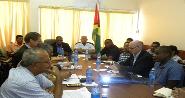 Minister of Public Infrastructure, David Patterson during the meeting with the Dutch Risk Reduction (DRR) Team and local engineers. Present also is Minister of Agriculture, Noel Holder