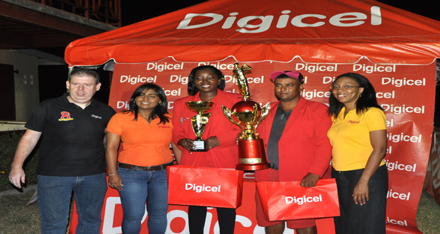 Champions Shanella Webster and Avinash Persaud with representatives from Digicel following the conclusion of the Digicel Guyana Open Golf Tournament.