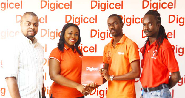 Digicel’s Sponsorship and Events Manager, Luanna Abrams (second from left) hands over the sponsorship package to Ministry of Education’s Glendon Fogenay; looking on are PR and Marketing Officer of the National Schools Championships, Edison Jefford (left) and Second VP of Guyana Teacher’s Union (GTU), Julian Cambridge.
