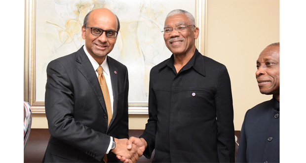 President David Granger gestures during a meeting with Tharman Shanmugaratnam, Deputy Prime Minister and Coordinating Minister for Economic and Social Policies of Singapore