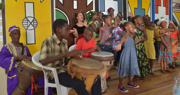 African drumming and singing formed part of Kwanzaa at ACDA’s headquarters yesterday