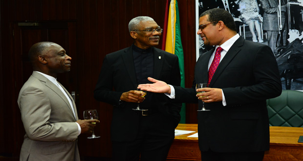 President David Granger shares a light moment with new Jamaican High Commissioner to Guyana, David Prendergast and Foreign Affairs Minister Carl Greenidge on Monday at the Ministry of the Presidency