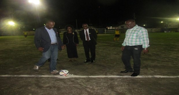 At left, GFF president Wayne Forde about to kick the ball to Banks DIH Communications Manager Troy Peters, as UDFA Organising Secretary Vanessa Kissoon and UDFA president Sharma Solomon look on.