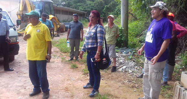 Vice President Allicock and his Advisor, Mervyn Williams, in discussion with persons at the construction site of the new Port Kaituma Hospital